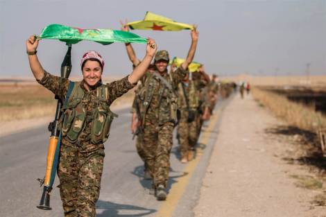 Kurdish women fighters enter Tel Abyad June 2015